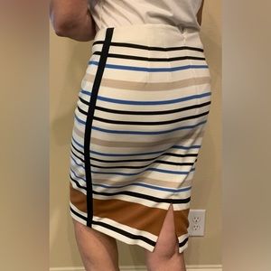 WHBM striped skirt with cream background, blue, black, and tan stripes.